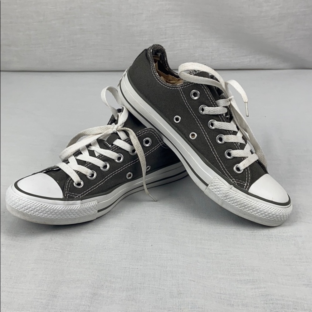 Women’s gray and pink converse sneakers